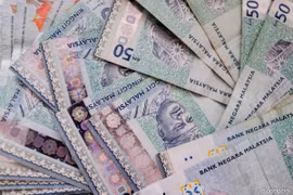 Malaisie: le ringgit tombe à son plus bas niveau en un an 