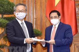 Le Premier ministre Pham Minh Chinh reçoit l'ambassadeur du Japon au Vietnam