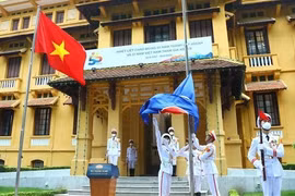 Cérémonie de levée du drapeau marquant le 55e anniversaire de l'ASEAN