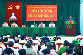 La rencontre entre le Premier ministre Pham Minh Chinh et des électeurs du district d'O Mon, ville de Can Tho. Photo : VNA