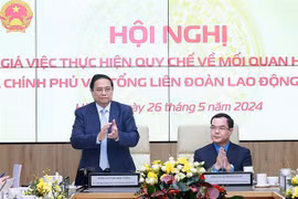 Le Premier ministre Pham Minh Chinh lors de la conférence. Photo : VNA