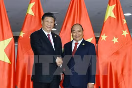 Le PM Nguyen Xuan Phuc rencontre le leader chinois Xi Jinping