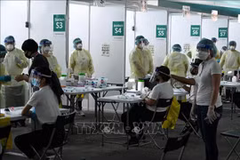 COVID-19 : Singapour enregistre plus de 10.000 cas par jour pour la première fois
