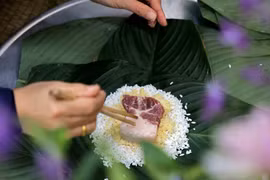 La confection de banh chung- une culture traditionnelle du peuple vietnamien à l’occasion du Tet