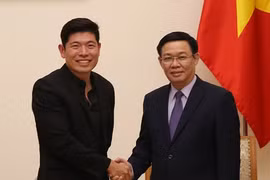 Le vice-PM Vuong Dinh Huê reçoit le directeur exécutif de Grab Anthony Tan
