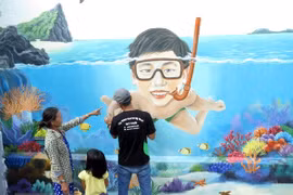L'IUCN lance un programme de fresques murales à An Binh