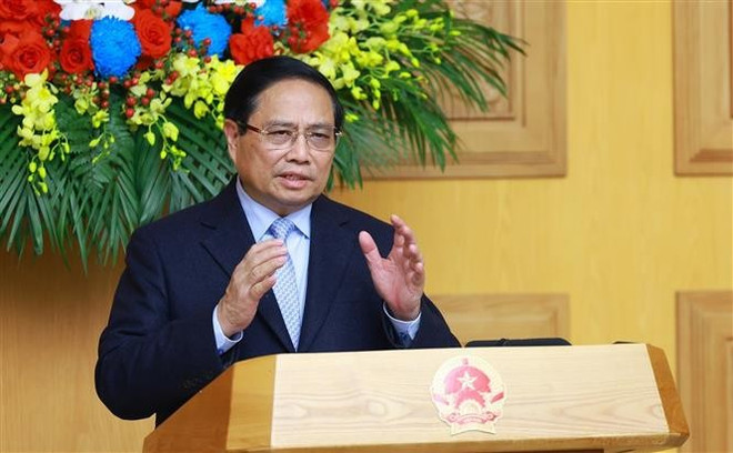 Le Premier ministre Pham Minh Chinh prend la parole lors de l'échange de vue. Photo : VNA pm.jpg