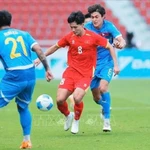 Les U22 vietnamiens affichent leur détermination face aux Philippines. Photo : VNA
