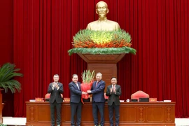 Le 14e Comité central du Parti élit à l'unanimité To Lam au poste de secrétaire général du Parti. Photo: VNA