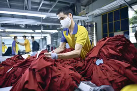 Le Vietnam enregistre une croissance à deux chiffres de ses exportations au cours des onze premiers mois de l’année. Photo: baodautu.vn