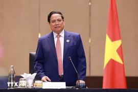 Le Premier ministre Pham Minh Chinh à la rencontre les ambassadeurs vietnamiens au sein de l'ASEAN. Photo: VNA