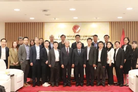 Des autorités de la province de Binh Duong et la dégélation du groupe taïwanais MiTAC. Photo: VNA