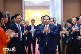 Le Premier ministre Pham Minh Chinh à la conférence annonçant la création du Centre financier international au Vietnam. Photo: VNA