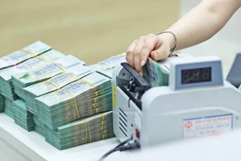 Les banques au sein du Centre financier international au Vietnam doivent assumer un rôle de "gatekeeper", chargé de contrôler les flux financiers, de sécuriser l’ensemble de la chaîne transactionnelle et de lutter contre les transferts de fonds illicites et le blanchiment transfrontalier. Photo: baodautu.vn