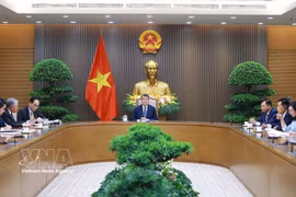 Entretien téléphonique entre le Premier ministre Le Minh Hung et son homologue néo-zélandais Christopher Luxon. Photo: VNA