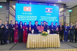 Cérémonie de signature d'un accord de coopération pour la période 2026-2030 entre Thanh Hoa et Houaphan. Photo: VNA