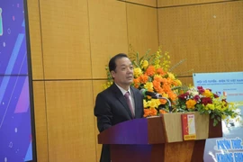 Le vice-ministre des Sciences et des Technologies, Pham Duc Long, s'exprime à la conférence. Photo: VNA