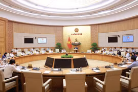 Panorama de la réunion législative mensuelle du gouvernement. Photo: VNA