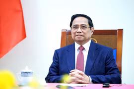 Le Premier ministre Pham Minh Chinh à l'entretien téléphonique. Photo: VNA