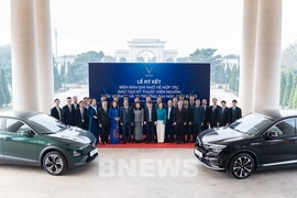 Les délégués à la cérémonie de signature de l'accord de coopération. Photo: VNA