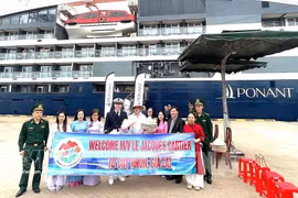 Cérémonie d'accueil des croisiéristes internationaux. Photo: VNA