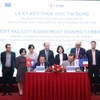 Cérémonie de signature de l'accord de prêt entre EVN et AFD. Photo: VNA
