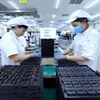Une chaîne de production de cartes de circuits imprimés de Nexcon Vietnam à Bac Ninh. Photo : VNA