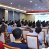 Colloque sur la promotion de la coopération commerciale et de l’investissement sur les marchés des Émirats arabes unis et du Moyen-Orient. Photo : Tapchicongsan 