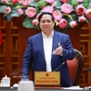 Le Premier ministre Pham Minh Chinh s'exprime lors de la réunion du 10 mars. Photo: VNA
