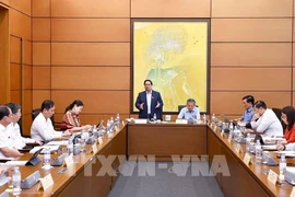 Le Premier ministre Pham Minh Chinh lors des discussions en groupes dans le cadre de la 9e session de l’Assemblée nationale, le 23 mai. Photo: VNA