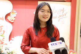 De nombreux étudiants vietnamiens en Chine expriment leur intérêt pour cet événement politique majeur. Photo: VNA