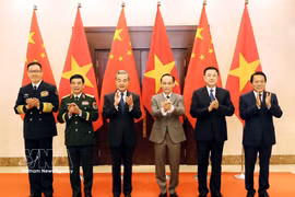 Les ministres des Affaires étrangères, de la Défense et de la Sécurité publique du Vietnam et de la Chine lors de la premier réunion du Dialogue stratégique « 3+3 ». Photo : VNA