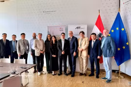La délégation de l'Association nationale de cybersécurité (NCA), a une séance de travail avec l’Institut autrichien de technologie (AIT). Photo: VNA