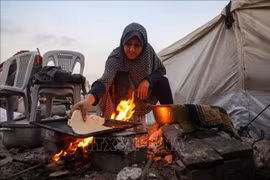 Des Palestiniens dans la région de Cheikh Radwan, au Nord de Gaza. Photo : Xinhua/VNA
