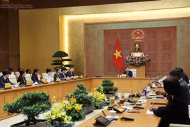 La rencontre entre le vice-Premier ministre permanent Pham Gia Tuc et des représentants d’associations et d’entreprises américaines investissant et opérant au Vietnam, le 17 juillet à Hanoï. Photo: baochinhphu.vn