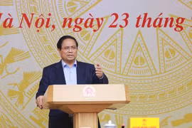 Le Premier ministre Pham Minh Chinh présidé la 14ᵉ réunion de la Comité nationale de lutte contre la pêche illicite, non déclarée et non réglementée. Photo: VNA