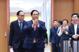 Le Premier ministre Pham Minh Chinh a présidé la Conférence nationale de bilan de la mise en œuvre de la Résolution n° 36-NQ/TW sur le travail à l’égard des Vietnamiens résidant à l’étranger. Photo: VNA