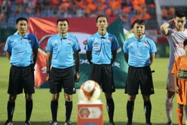 Des arbitres lors de la V-League. Photo : VFF
