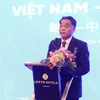 Le vice-président du Comité populaire de Hô Chi Minh-Ville, Nguyen Loc Ha, s'exprime au séminaire d’entreprises vietnamiennes et chinoises. Photo: VNA