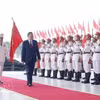 Le secrétaire général du Parti et président vietnamien, To Lam, passe en revue la garde d'honneur de la Sécurité publique populaire. Photo : VNA