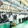 Chaîne de montage de motos de Honda à Phu Tho. Photo : Bnews/VNA