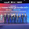 Lancement du service de paiement transfrontalier par QR code entre le Vietnam et Singapour. Photo: bnews.vn