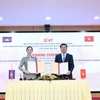 Signature d’un accord sur le renforcement du commerce Vietnam-Cambodge pour 2025-2026. Photo: VNA
