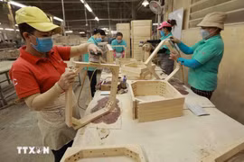 Le bois et les produits dérivés figurent parmi les sept groupes de produits agricoles, sylvicoles et aquatiques ayant enregistré une valeur d’exportation de plus d’un milliard de dollars. Photo : VNA