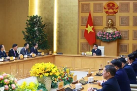 Le Premier ministre Pham Minh Chinh reçoit l'ambassadeur de Chine au Vietnam, He Wei. Photo : VNA