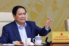 Le Premier ministre Pham Minh Chinh s'exprime lors de la réunion. Photo: VNA