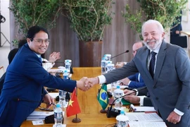 Le Premier ministre Pham Minh Chinh et le président brésilien, Luiz Inacio Lula da Silva. Photo: VNA