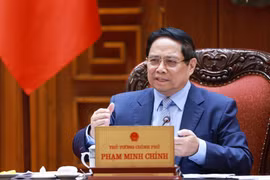 Le Premier ministre Pham Minh Chinh s'exprime lors de la réunion. Photo: VNA
