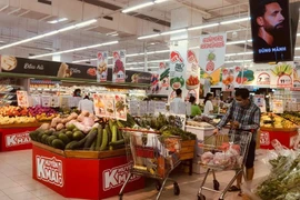 La réussite dans le contrôle de l'inflation en 2024 constitue une base solide pour permettre au Vietnam de faire face aux défis prévus en 2025. Photo d'illustration: Vietnam+