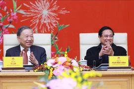 Le secrétaire général To Lam et le Premier ministre Pham Minh Chinh lors de la rencontre. Photo : VNA